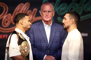 Rolly Romero and Teofimo Lopez face off after an Aug. 20 press conference ahead of their WBA welterweight title fight at T-Mobile Arena in Las Vegas on Aug. 22, 2026.