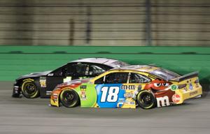 Monster Energy NASCAR Cup Series driver Kurt Busch (1) and Monster Energy NASCAR Cup Series driver Kyle Busch (18) race against