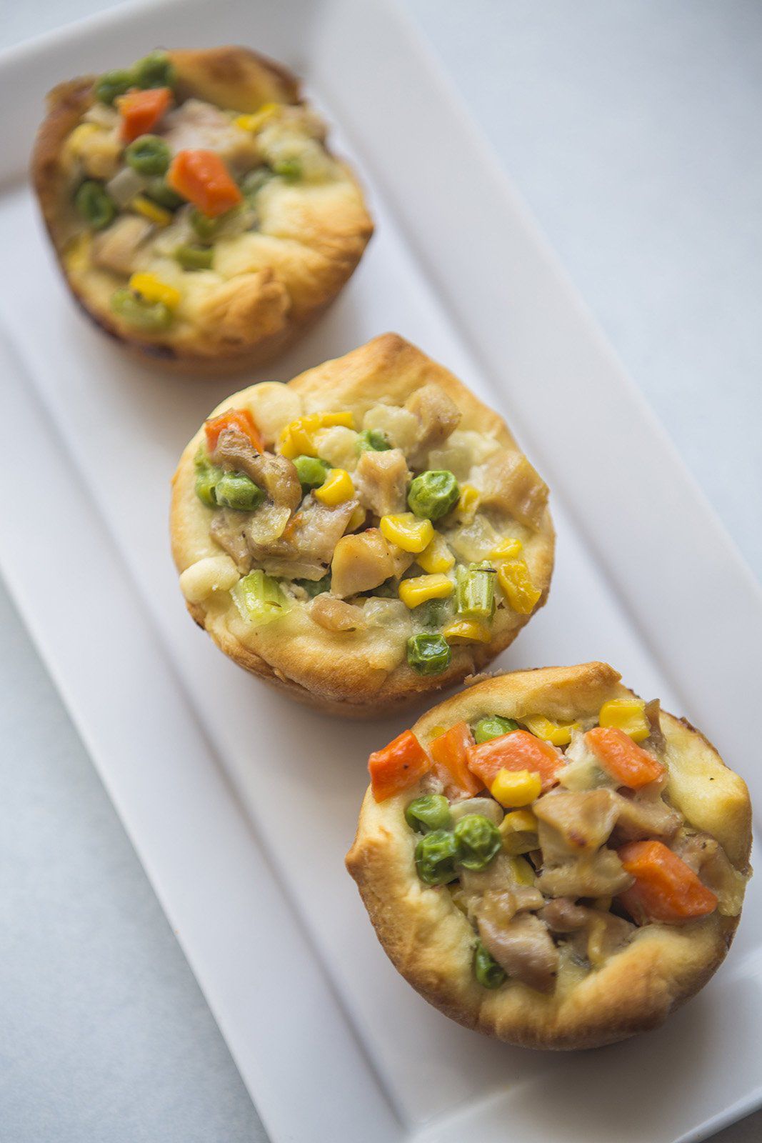 twice baked potatoes in a casserole dish