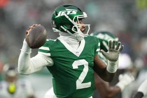 Nov 30, 2025; East Rutherford, New Jersey, USA; New York Jets quarterback Tyrod Taylor (2) drops back to pass against the Atlanta Falcons during the first half at MetLife Stadium. Mandatory Credit: Robert Deutsch-Imagn Images