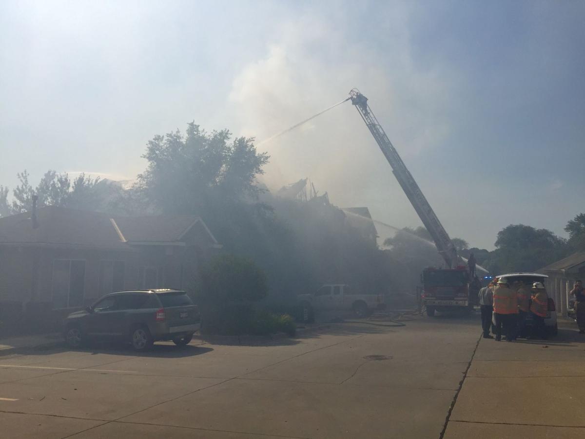 Firefighter, 2 others injured as roof collapses at Bellevue apartment