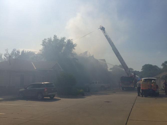 Firefighter, 2 others injured as roof collapses at Bellevue apartment fire