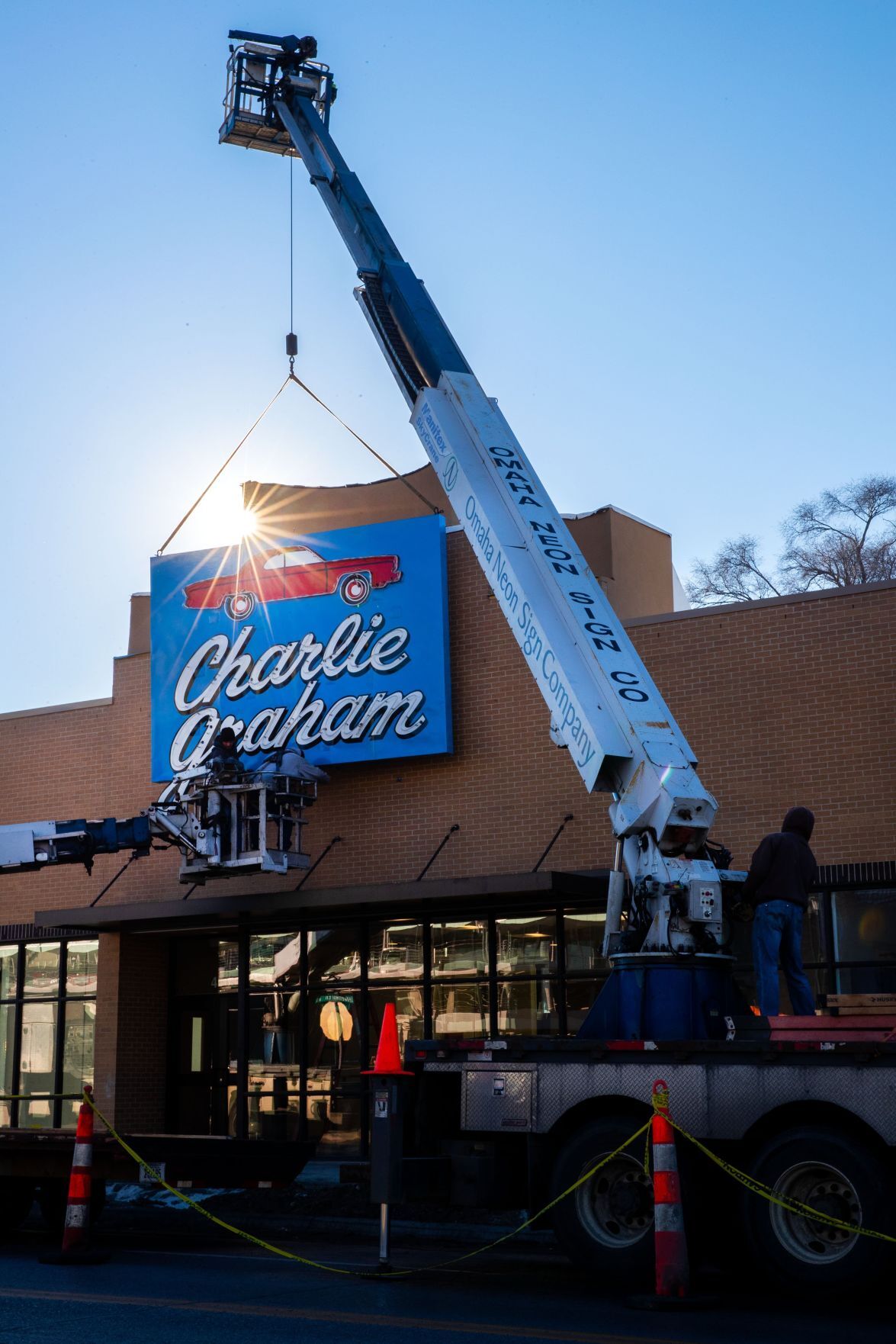 'Iconic' neon Charlie Graham auto sign on the move, again Local