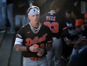 Tigers prospect Max Clark walks through the dugout in the ninth inning as the Detroit Tigers take on the New York Yankees at George M. Steinbrenner Field in exhibition in Tampa, Fla. on Feb. 21, 2026.