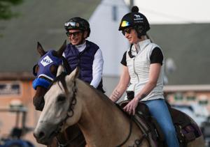 Two-time Kentucky Derby winning jockey Mike Smith smiles while aboard 2026 Derby contender So Happy as the two prepare to take