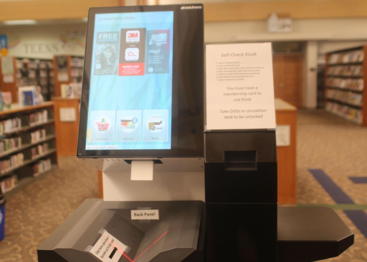 A self checkout machine makes its way to the La Vista Library ...