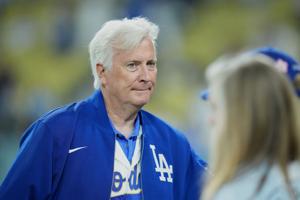 Mar 26, 2026; Los Angeles, California, USA; Los Angeles Dodgers owner and chairman Mark Walter walks on the field after the game against the Arizona Diamondbacks at Dodger Stadium. Mandatory Credit: Kirby Lee-Imagn Images