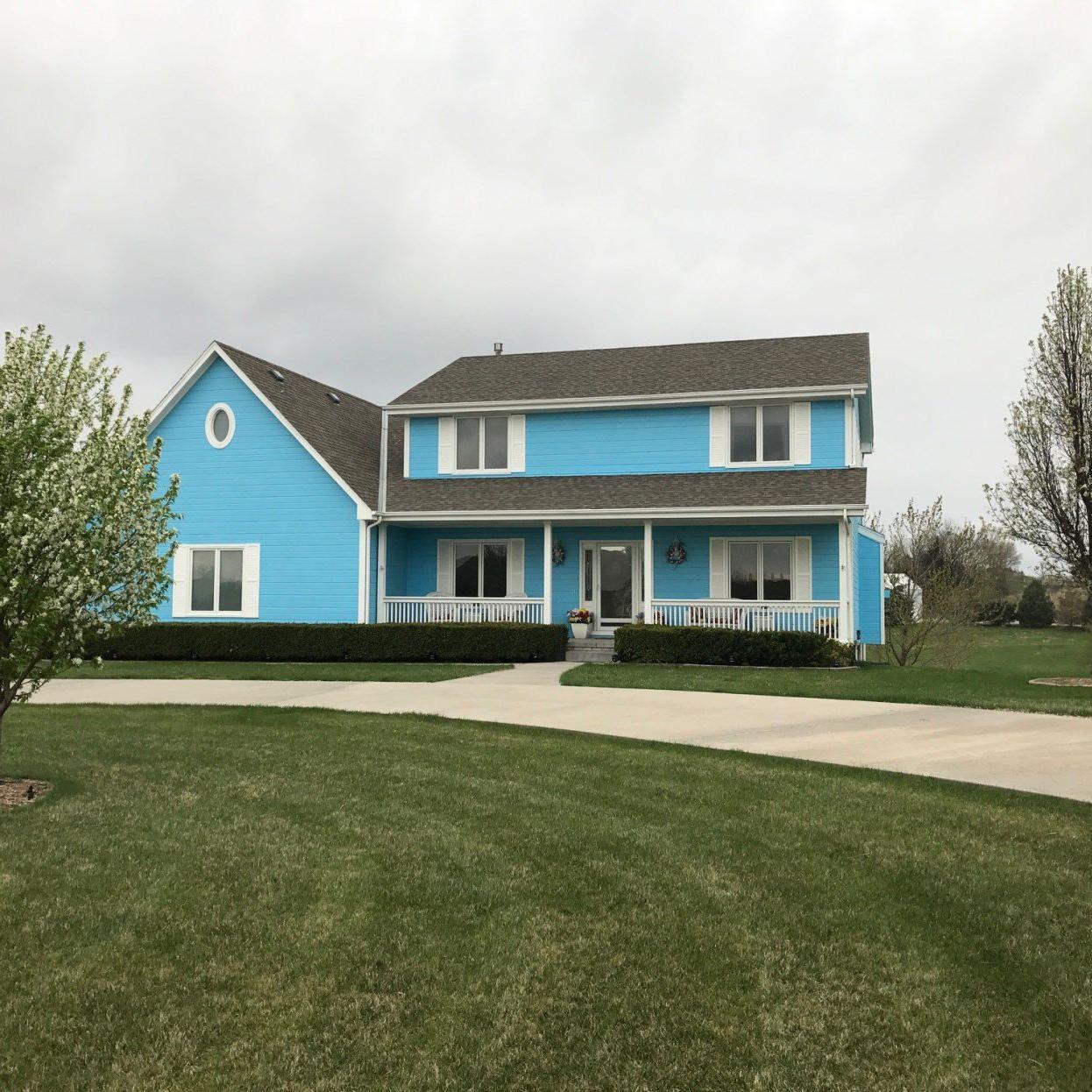 After They Painted Their House Blue The Homeowners Association