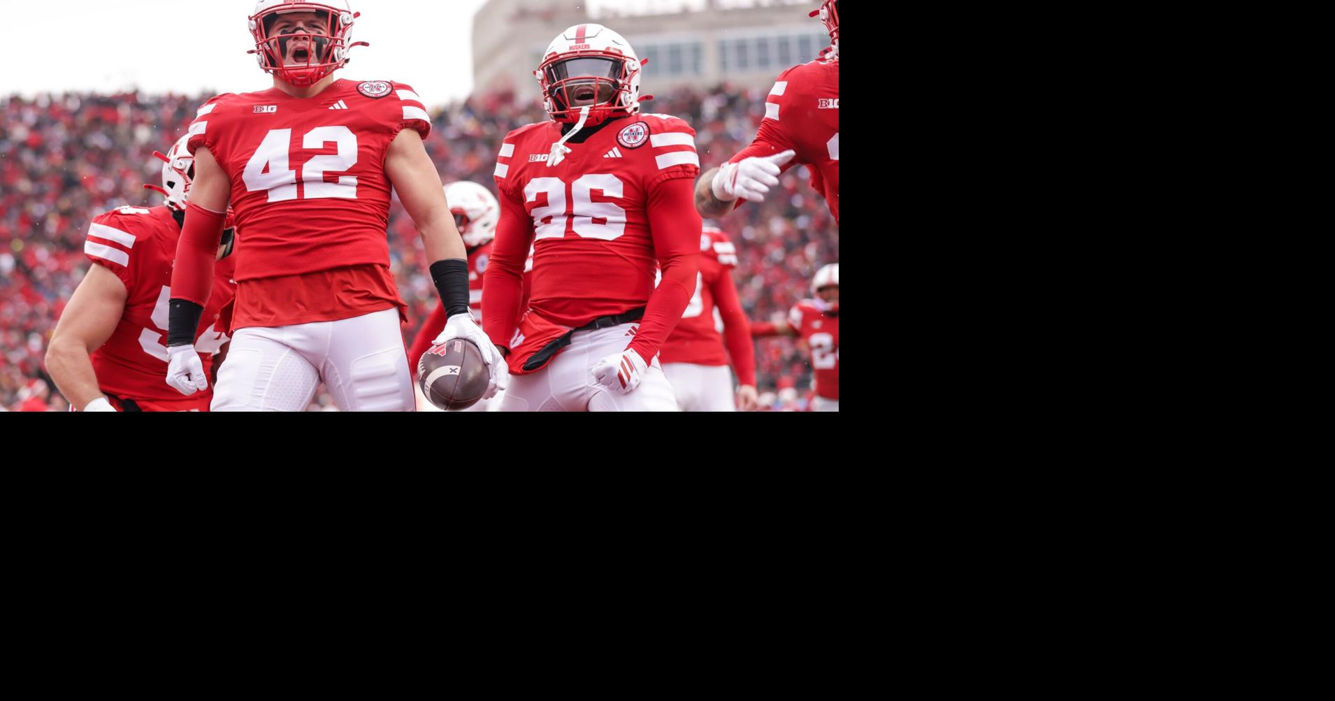Nebraska's Derek Wacker (42) celebrates after he recovered a punt ...