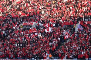 Utah Utes fans celebrate a touchdown against the Kansas State Wildcats during the second half at Rice-Eccles Stadium.