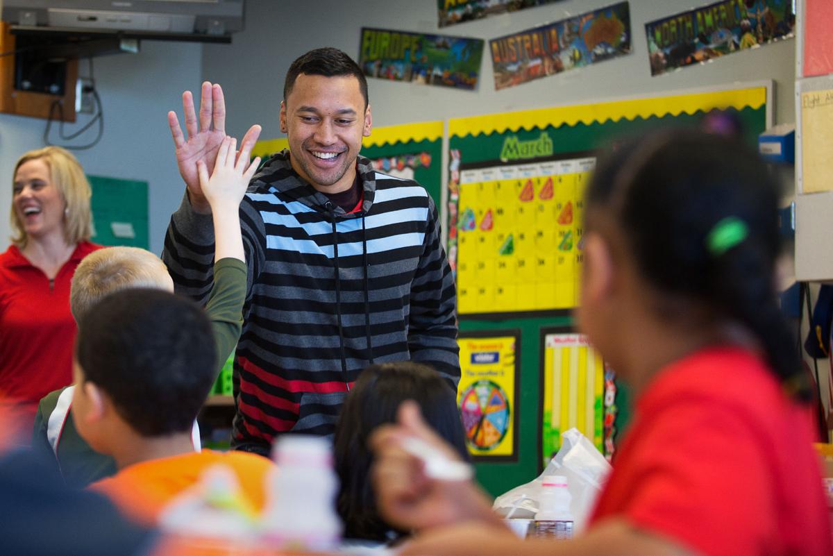 Former Husker Roy Helu Jr. visits Omaha school Local News