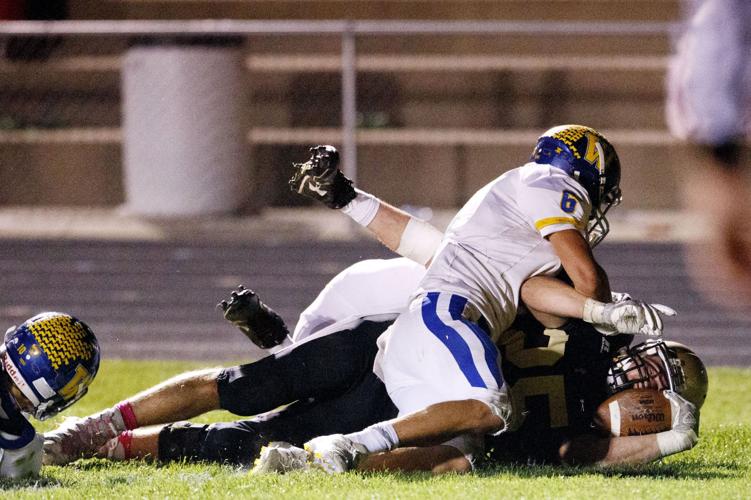 Pospisil No. 3 David City Aquinas downs No. 2 Wahoo in Class C1