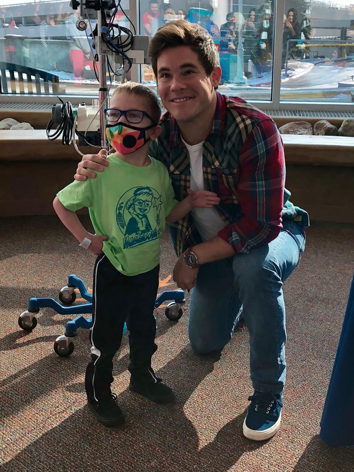 Years after he was a patient, Adam Devine returns to Children's