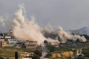 Smoke billows following an Israeli strike in Nabatieh