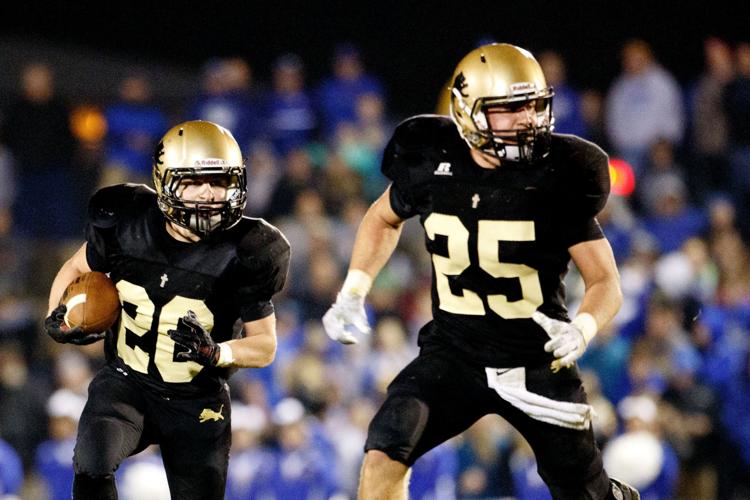 Pospisil No. 3 David City Aquinas downs No. 2 Wahoo in Class C1