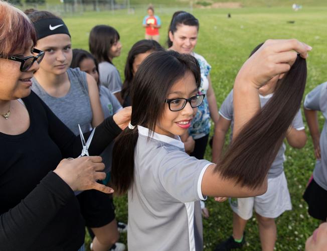 Girls on Omaha youth soccer team cut their hair in solidarity with teammate  who was mistaken for a boy