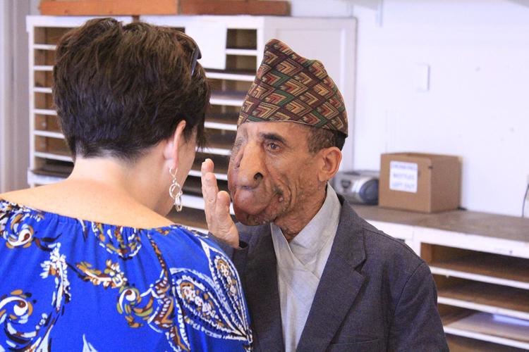 'Art ... is everywhere': Nepalese man gets new lease on life through art professor's portrait