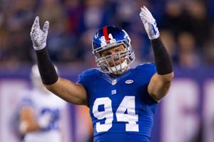 Oct 25, 2015; East Rutherford, NJ, USA; New York Giants outside linebacker Mark Herzlich (94) gets the crowd going in the 4th quarter against the Dallas Cowboys at MetLife Stadium. Mandatory Credit: William Hauser-USA TODAY Sports