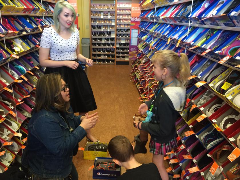 Payless donation means happy feet for 50 local homeless children Good