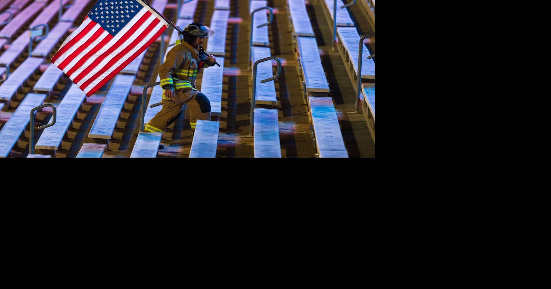 'One step at a time': 9/11 Memorial Stadium stair climb remembers victims 25 years later