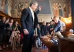 Nebraska Gov. Pillen celebrates Pig Day by naming, riding pig statue