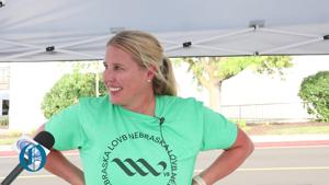 Dani Busboom Kelly speaks during LOVB Nebraska Block Party