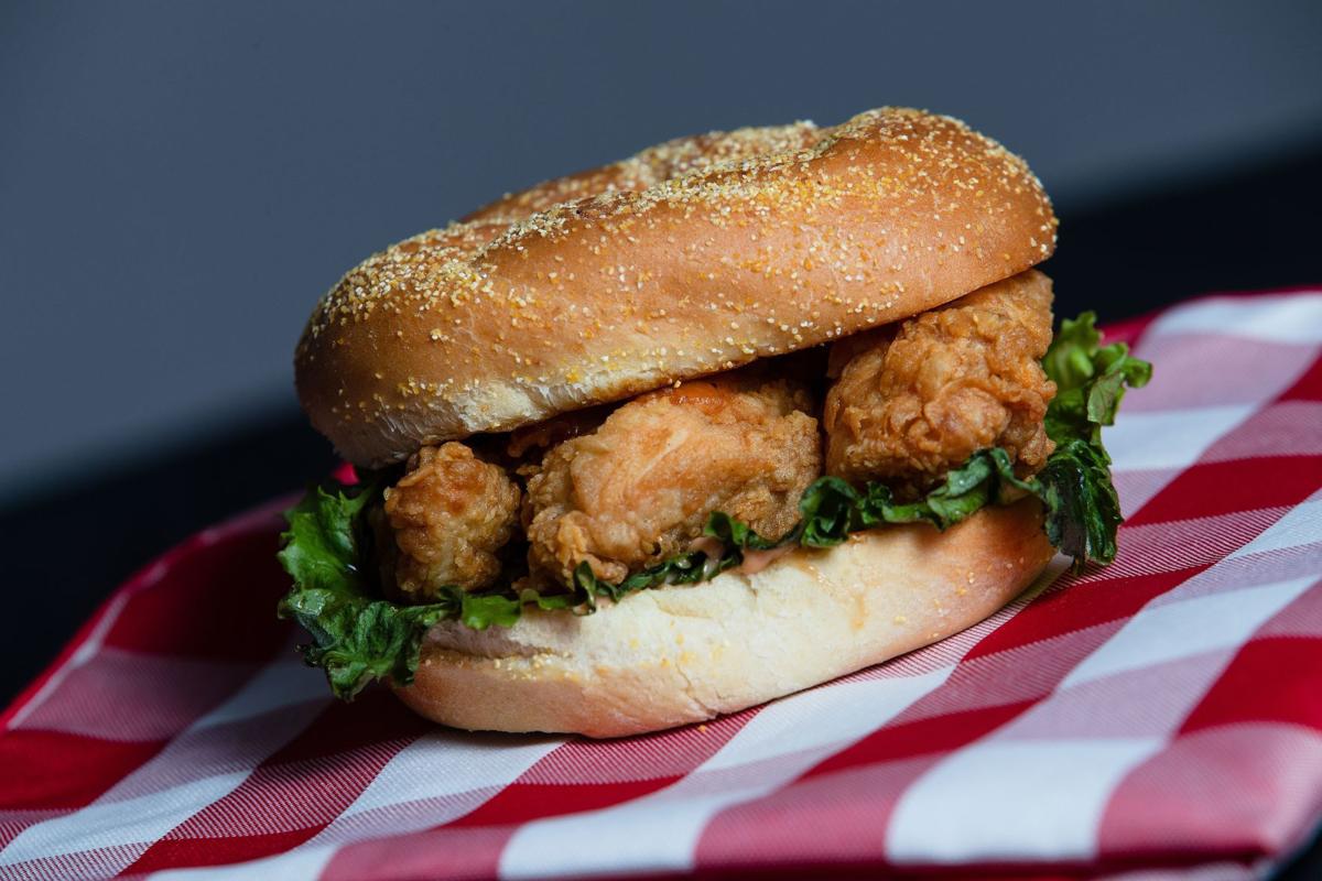 Here's how the Popeyes chicken sandwich stacks up against KFC, Raising