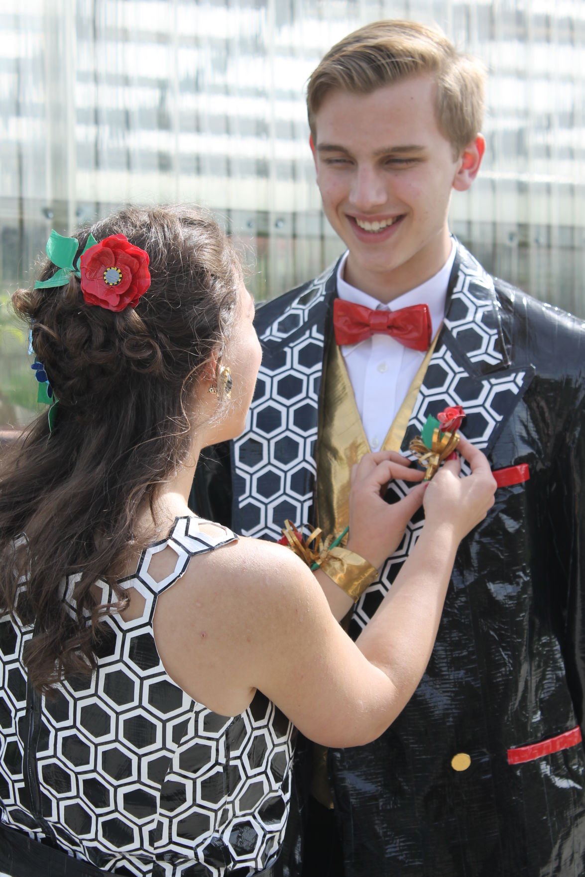 red prom dress and tux