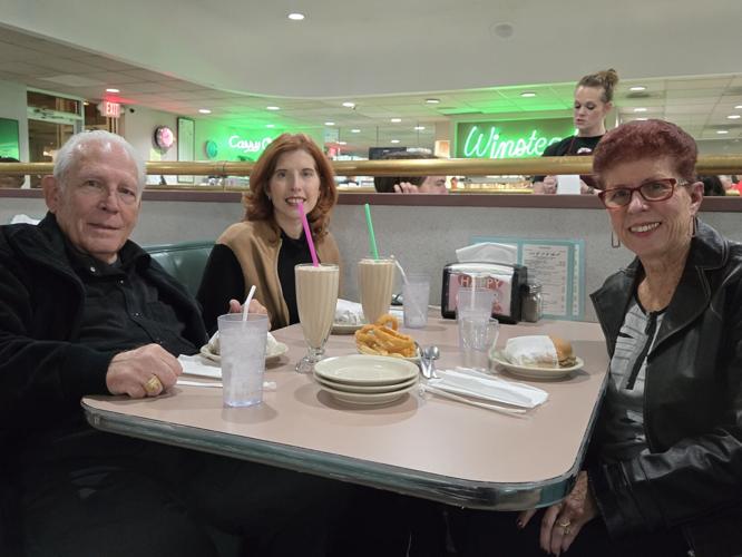 Heidi MacDonald and her parents