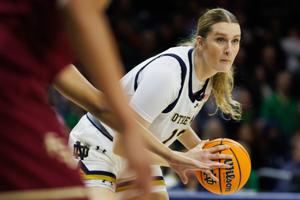 Notre Dame forward Kate Koval looks for an open teammate during a NCAA women's basketball game between No. 3 Notre Dame and No. 24 Florida State at Purcell Pavilion on Thursday, Feb. 27, 2025, in South Bend.
