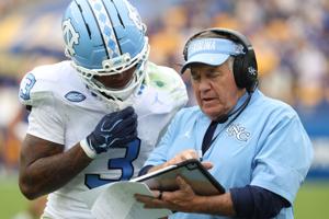 Oct 10, 2026; Pittsburgh, Pennsylvania, USA;  *North Carolina Tar Heels defensive back Ade Willie (3) talks with North Carolina Tar Heels head coach Bill Belichick (right) during the fourth quarter against the Pittsburgh Panthers at Acrisure Stadium.
