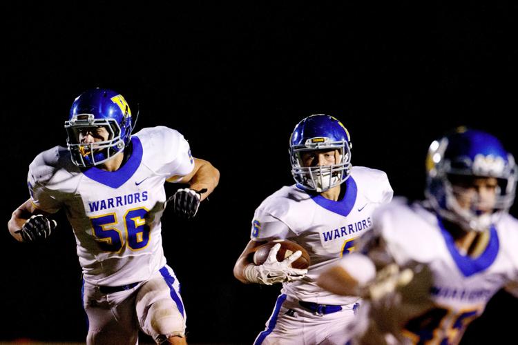 Pospisil No. 3 David City Aquinas downs No. 2 Wahoo in Class C1