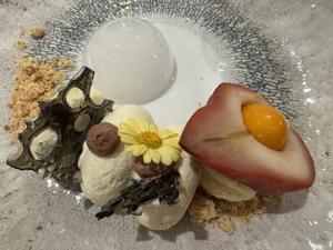 The ship pastry chef's elevated take on a classic French poached pear dessert, poire belle-Helene.