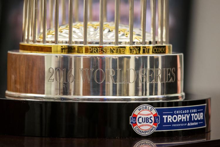 Banner day for Chicago Cubs fans: World Series trophy comes to