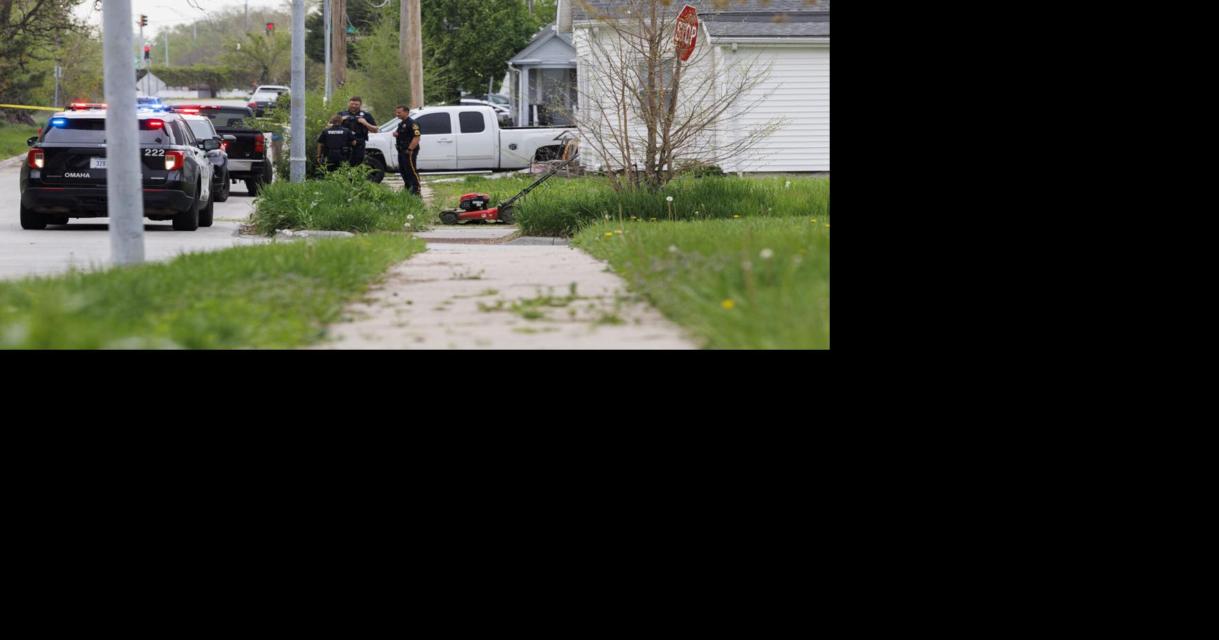 Man arrested in connection with shooting of 2 men mowing lawn in Omaha