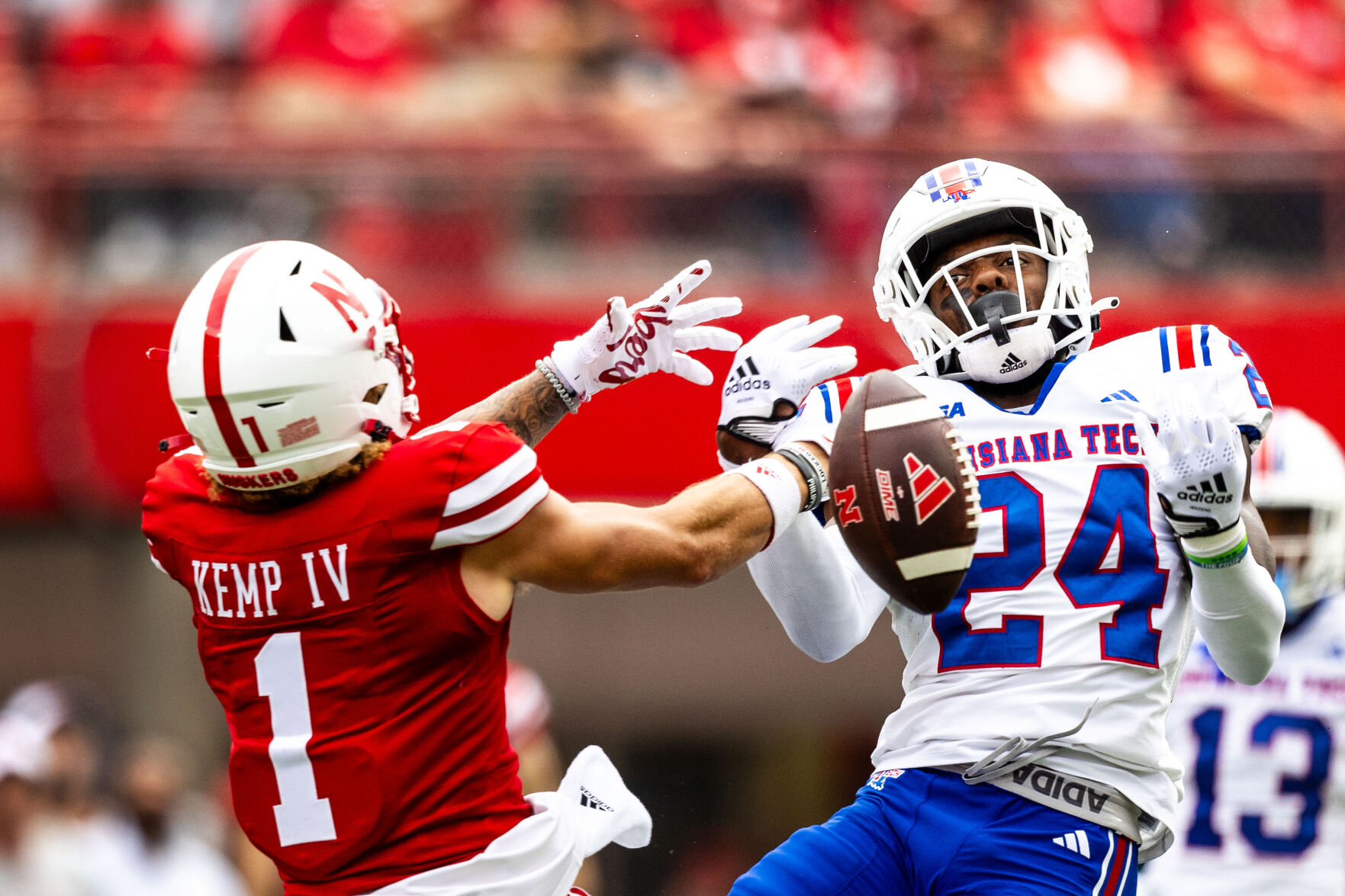 Adrian and Taylor Martinez seen together at Nebraska game