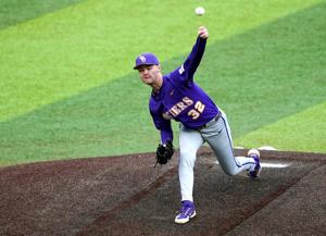 LSU's Kade Anderson (32) throws a pitch during the college baseball game between the University of Oklahoma Sooners and the LSU Tigers at L. Dale Mitchell Park in Norman, Okla., Thursday, April, 3, 2025.