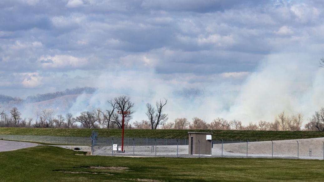 Smoke visible at Omaha airport after fire north of Council Bluffs reignited