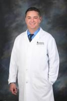 Dr. William Thomas, M.D.