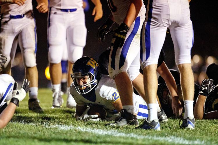 Pospisil No. 3 David City Aquinas downs No. 2 Wahoo in Class C1