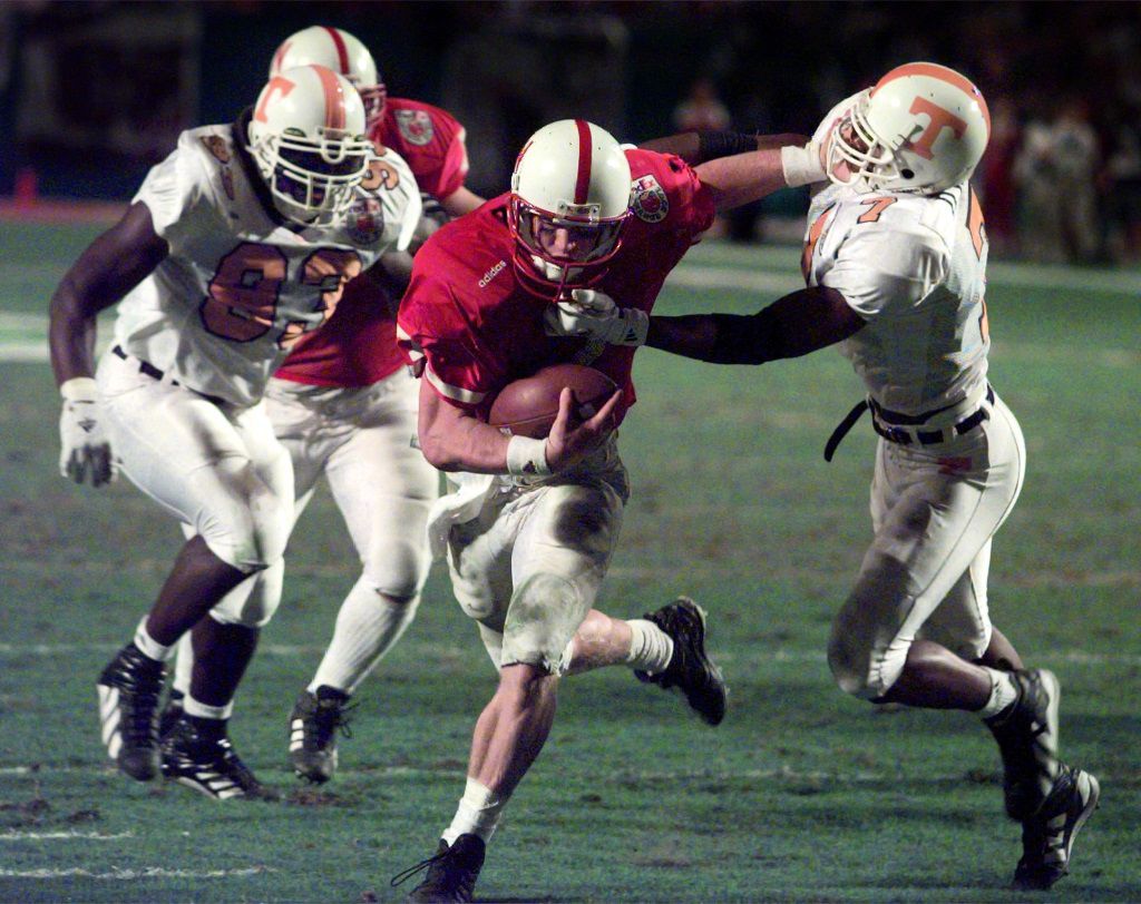 Hawaii wide receiver Rico Bussey (8) knocks over New Mexico cornerback Tony  Collier (2) during the