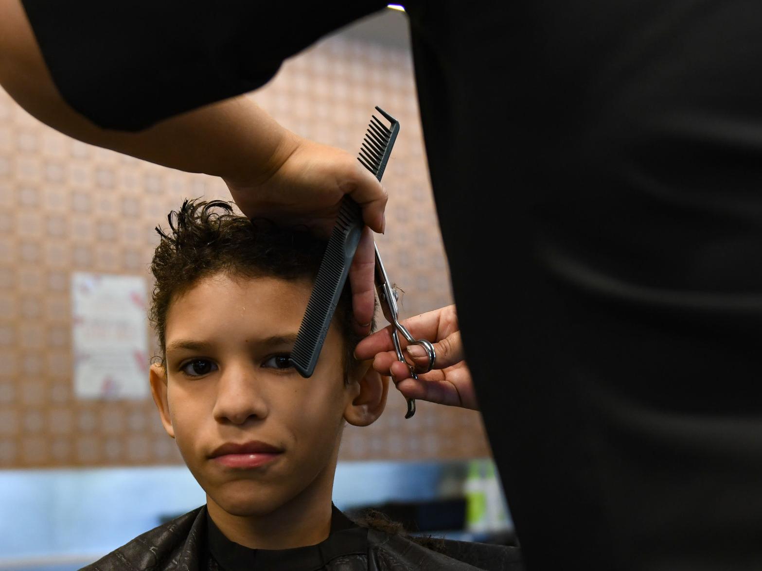 Omaha hairstylists provide back-to-school haircuts to more than 10