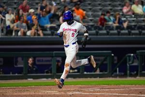 Knoxville Smokies shortstop Ed Howard (9) scores at home during a baseball game against the Montgomery Biscuits on Tuesday, May 19, 2026, at Covenant Health Park in Knoxville, Tennessee. Photo by Nolan Keesee