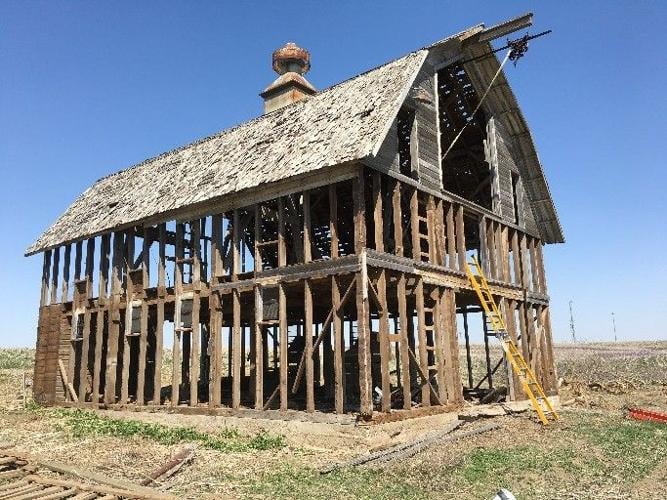 Century-old barn north of Highway 370 will come down; wood will be