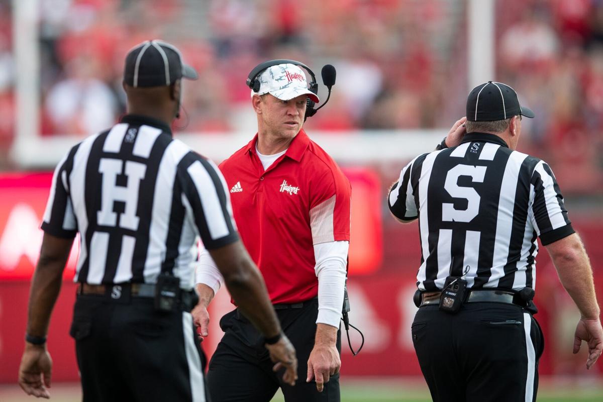 Scott Frost with refs