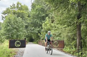 A cyclist on the Swamp Rabbit Trail.