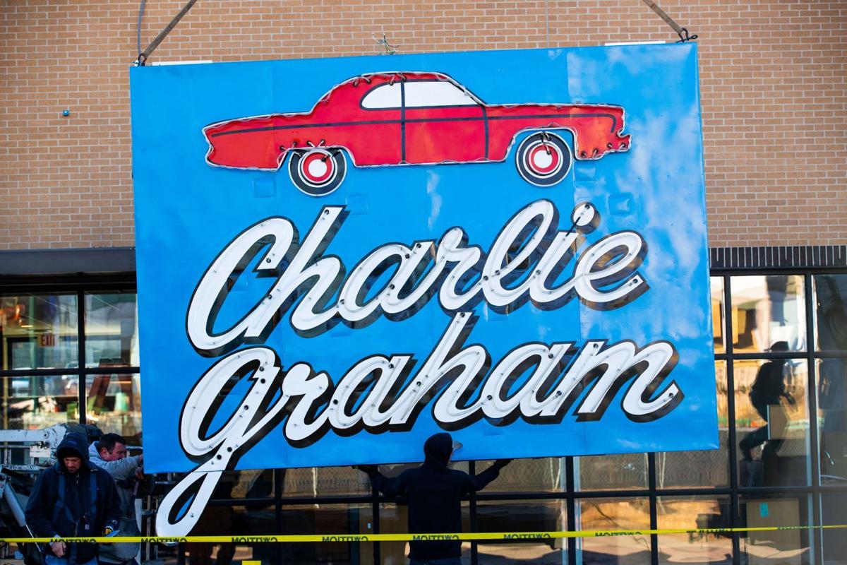 'Iconic' neon Charlie Graham auto sign on the move, again Local