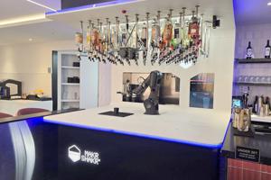 Minneapolis airport's new Portal Lounge has a robot bartender. Here’s what it’s like