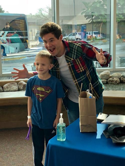 Years after he was a patient Adam Devine returns to Children #39 s