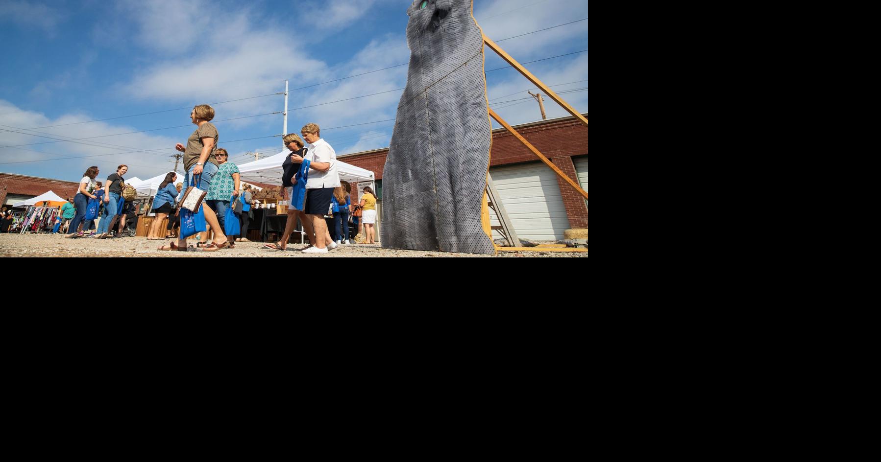 Grace Going shopping in north downtown at Hutchfest, where handmade counts